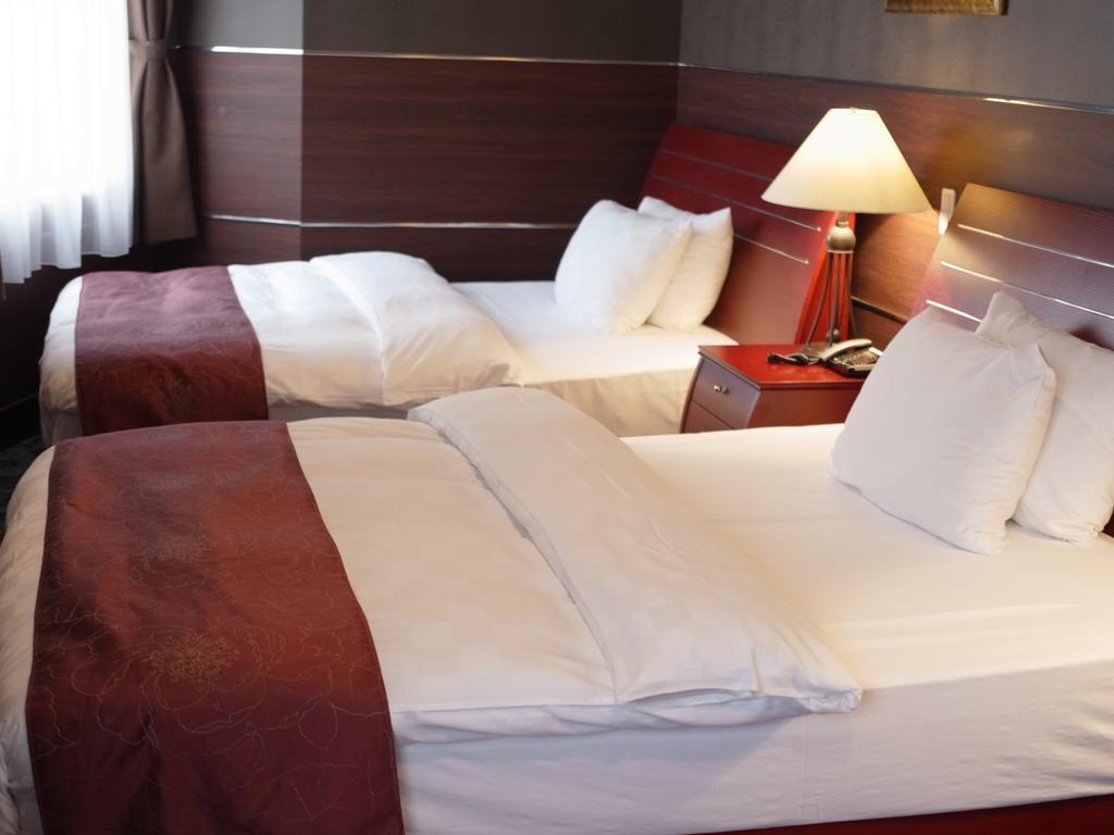 King Ambassador Hotel Kumagaya Rom bilde