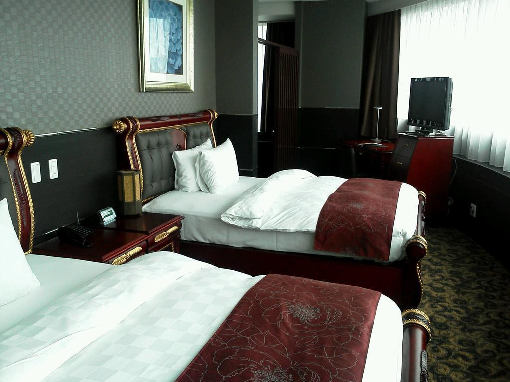 King Ambassador Hotel Kumagaya Rom bilde
